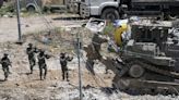 There's progress reported in Gaza truce talks, but Israel downplays chances of ending war with Hamas