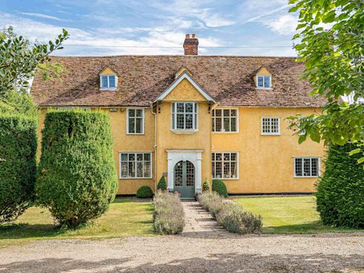 Striking yellow Grade II-listed home with its own vineyard for sale