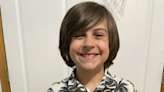 A fifth grader's fundraiser cleared his school of meal debt. It named an award for him