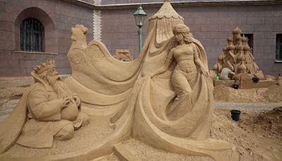 Artists craft masterpieces despite rain at the St Petersburg Sand Sculpture Festival