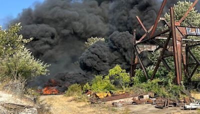 Ross Island fire fills Portland sky with smoke as crews use fireboats to reach flames