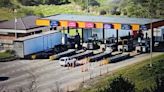 Traffic backs up at the Ghent toll booth due to stuck truck