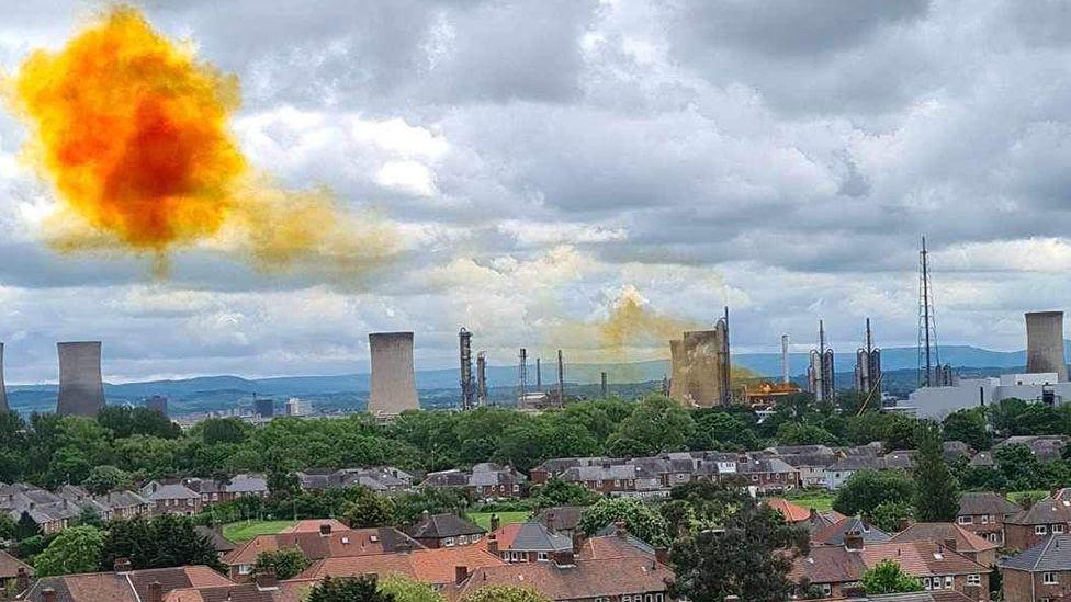 Orange nitrous oxide cloud released over town