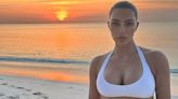 Kim Kardashian Hit the Beach in Peekaboo Granny Panties and a Sports Bra