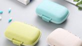 Amazon shoppers love this discreet $5 travel pill organizer that looks like an AirPods case: ‘Best by far’
