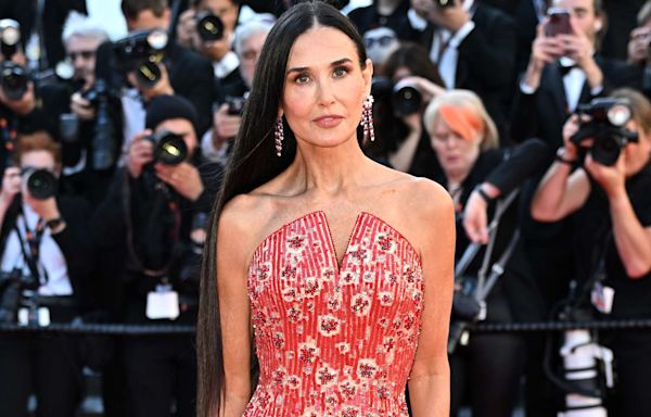 Demi Moore Makes Her Mark on the Cannes Red Carpet in Red-Hot Gown and Waist-Length Hair
