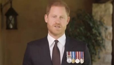 Harry's subtle snub to royal family? Prince doesn't wear Coronation medal given to him by King Charles to present 'Soldier of the Year' award - after previously dropping it in ...