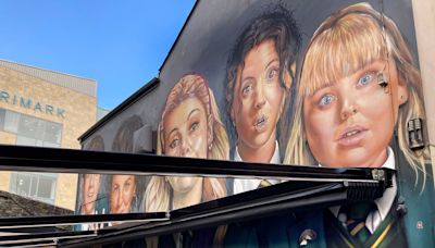 Controversy over partial blocking of Derry Girls mural with beer garden roof