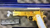 U.S. woman arrested with 24-carat gold-plated gun at Australian airport