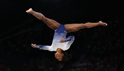 Simone Biles suffers balance beam slip at 2024 Olympics, moves to floor exercise after fall