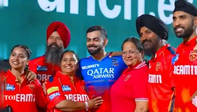 WATCH: Virat Kohli meets Arshdeep Singh and Harpreet Brar's family, wins hearts | Cricket News - Times of India