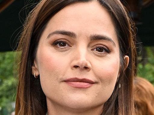 Jenna Coleman shows off her growing bump in a chic pink shirt dress