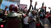 After passage of controversial finance bill in Kenya, demonstrators set Parliament building on fire; nearly 10 protesters dead