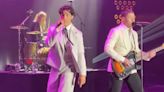 Joe Jonas Surprises Guests by Joining Brother Nick Jonas Onstage at the 30th annual AmfAR Gala in Cannes