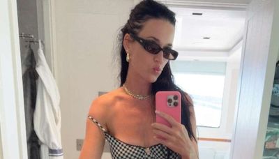 Katy Perry serves holiday style inspo in crochet beach cover-up and belly chain