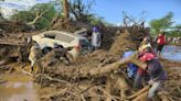 At least 40 people die in western Kenya after a dam collapses following heavy rains