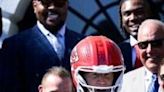 US President Joe Biden wears a Kansas City Chiefs helmet while speaking during a celebration for the Kansas City Chiefs, 2024 ...