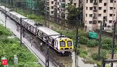 Mumbai's incessant rainfall disrupts flights and trains, IMD issues red alert