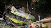 At least 16 dead and 12 injured as passenger bus falls off ravine in central Philippines