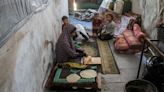 In Gaza, Palestinians return to a shelter scarred by war