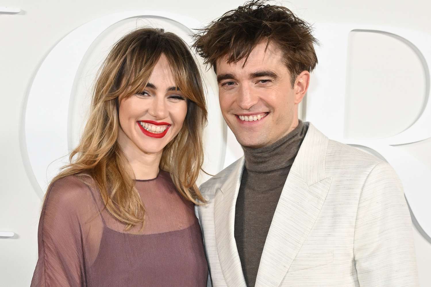 Suki Waterhouse Recalls 'Very Intense' Way She Met Robert Pattinson: 'I Light Up When I'm Around Him'