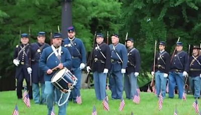 Attendees honor fallen Civil War veterans at Spring Grove Cemetery on Memorial Day