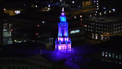 Why is the Denver City and County Building lighting up purple?