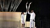 Perec follows idol Ali in lighting Olympic cauldron