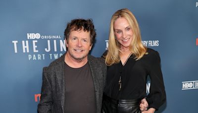 Michael J. Fox Totally Enamored by Wife Tracy Pollan’s Red Carpet Look in New Photos