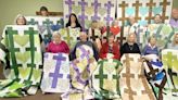 Foothills Quilters Guild gift 16 quilts to hospice