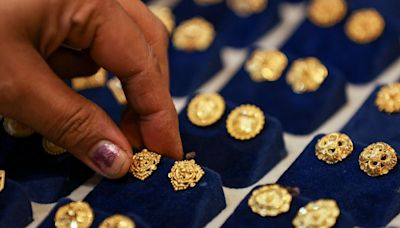 India slashes import tax on gold, silver to 6% to tackle smuggling