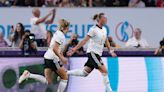 Germany ease to win over Spain to qualify as group winners