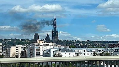 Rouen cathedral's spire is on fire, French TV shows