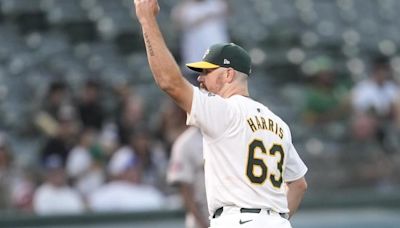 Hogan Harris and 3 Athletics relievers combine to blank Astros 4-0