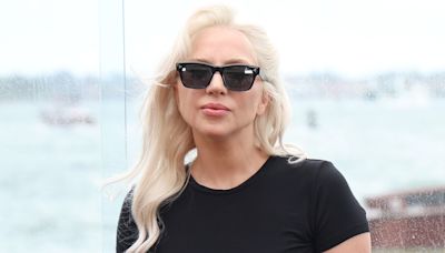 Lady Gaga poses with Joaquin Phoenix at Joker photocall in Venice