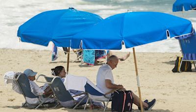 Joe Biden lounges at the beach in Delaware with Jill and Naomi