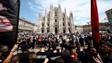 Supporters watch scandal-ridden former Italian PM Berlusconi’s controversial state funeral