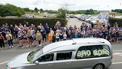 Mourners line streets to pay final respects to Rob Burrow ahead of funeral