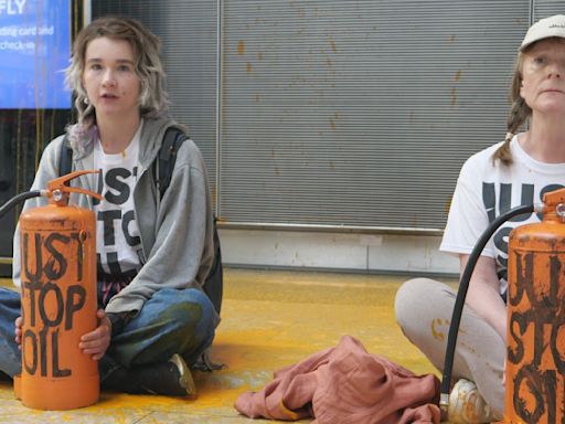 Just Stop Oil activists arrested after spraying part of Heathrow orange | ITV News