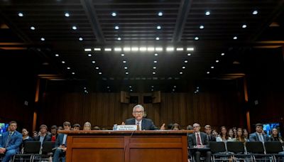 US economy no longer overheated, Fed's Powell tells Congress
