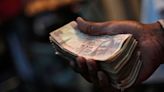 Rupee to run into dollar strength after unexpected rally