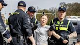 Greta Thunberg: Activist arrested at Hague climate protest