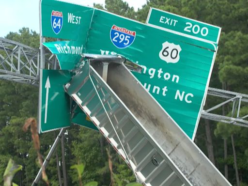 Tractor-trailer crashes into interstate’s overhead sign