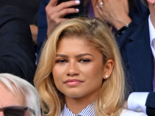 Zendaya Returns to Wimbledon in White Blazer, Pinstripes, and Tie