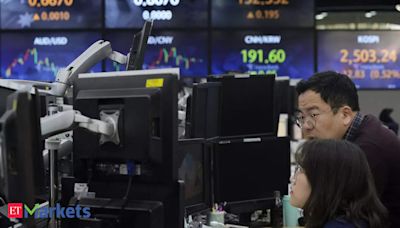 Asian shares fall as slew of rate decisions ahead: Markets wrap - The Economic Times