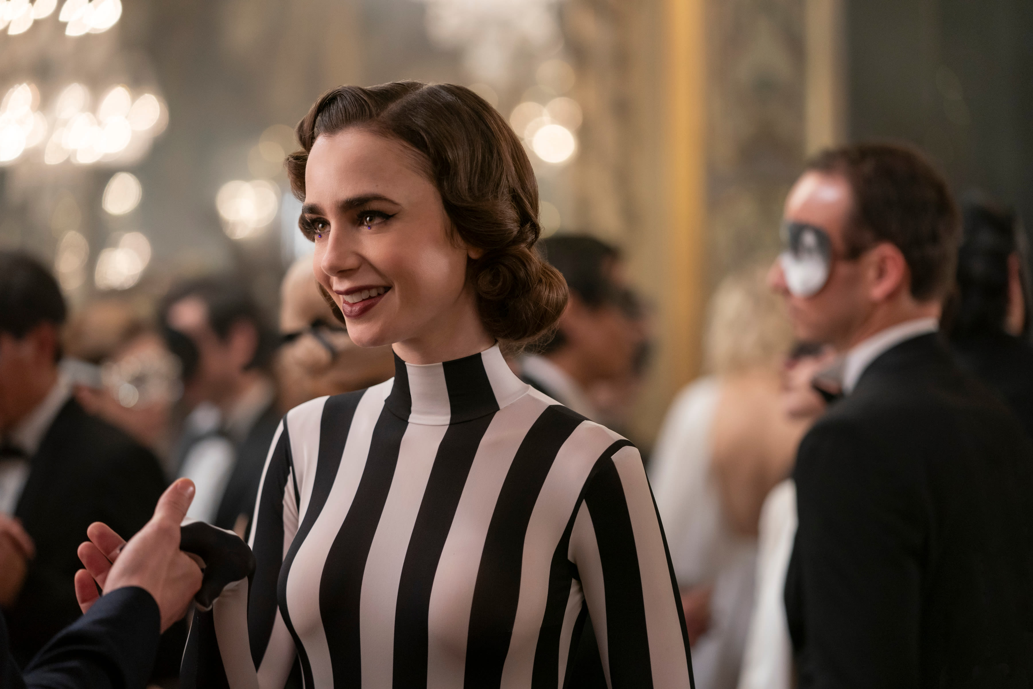 Lily Collins Unpacks ‘Emily in Paris’ Season 4 Moments Like Masquerade Ball Scene: “You Can’t Half-Ass It”