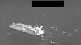 US Navy video shows a dozen Iranian fast-attack boats swarming an oil tanker in its latest maritime seizure