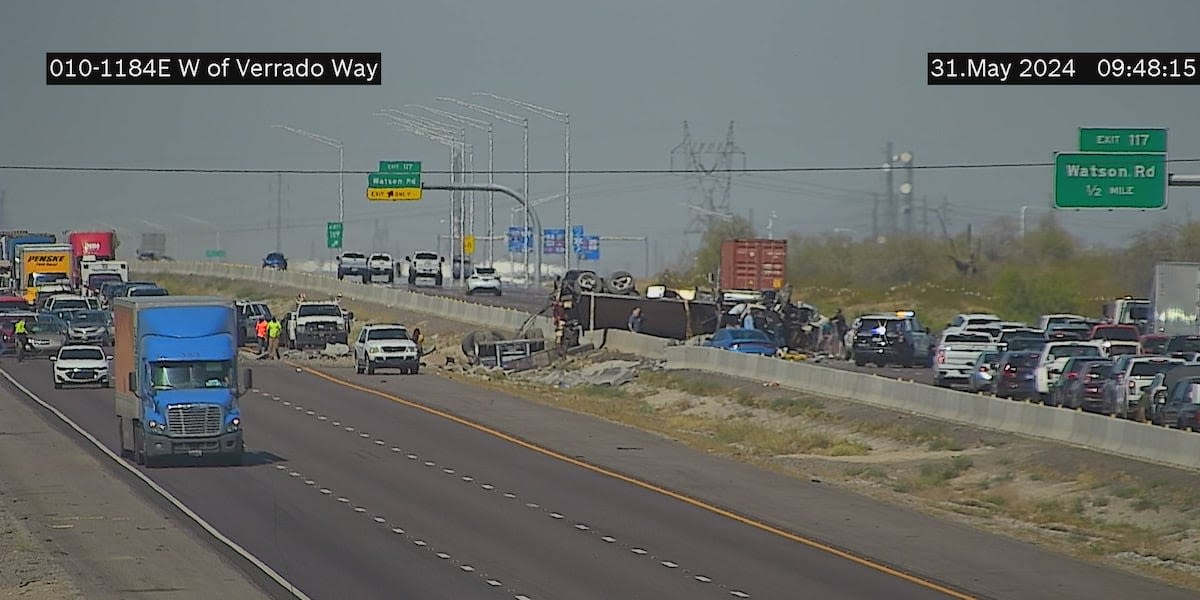Driver injured after tractor-trailer overturns, loses load on I-10 in Buckeye