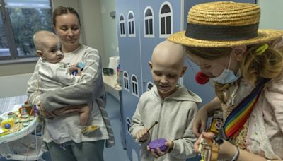 Hospital clowns bring joy to young Ukrainian cancer patients who survived Russian missile attack