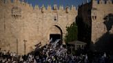 Israeli nationalists march in Jerusalem as a far-right minister boasts of Jewish prayer at key site